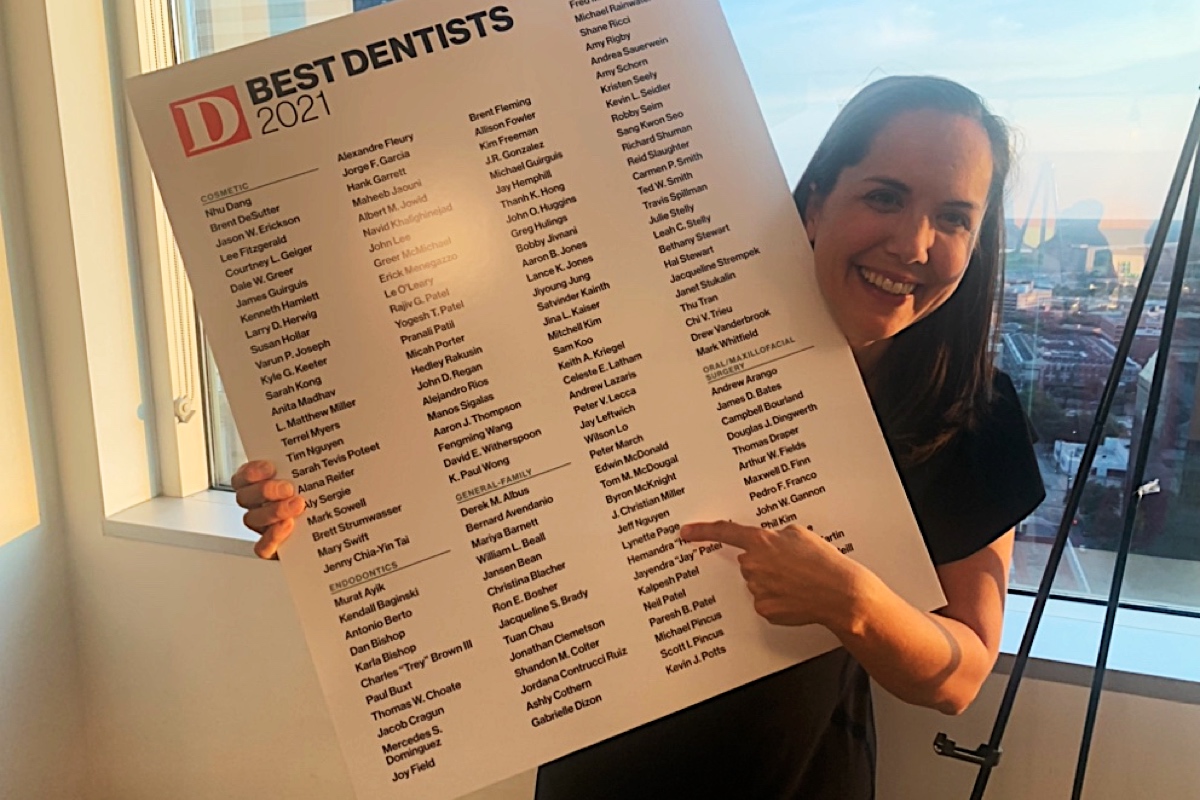 Dr. Page receiving her best dentist award